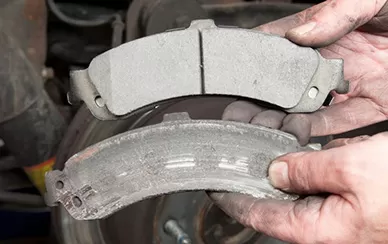 Why is one brake pad worn?